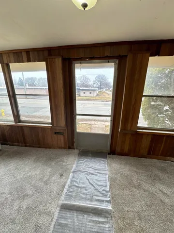 an empty room with windows