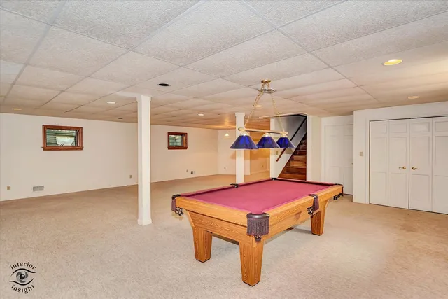 a view of a wooden deck and trees around