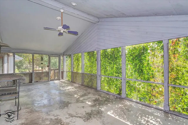 a view of a backyard with a small cabin