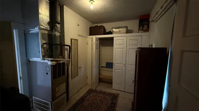 a bathroom with a shower and a sink