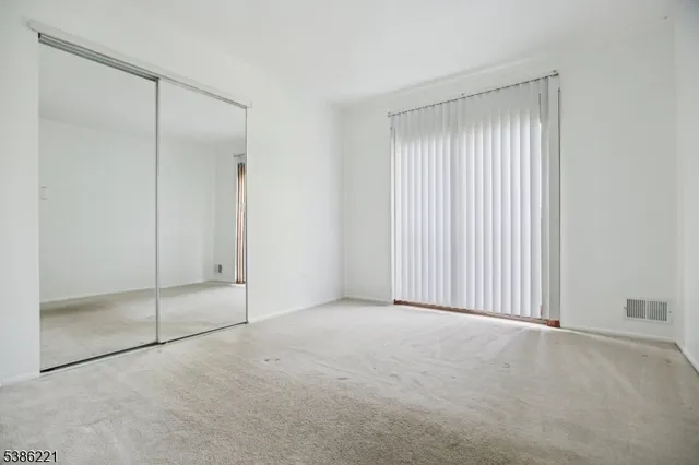 a view of an empty room with window