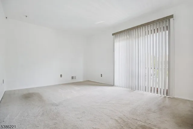 a view of a room with a window