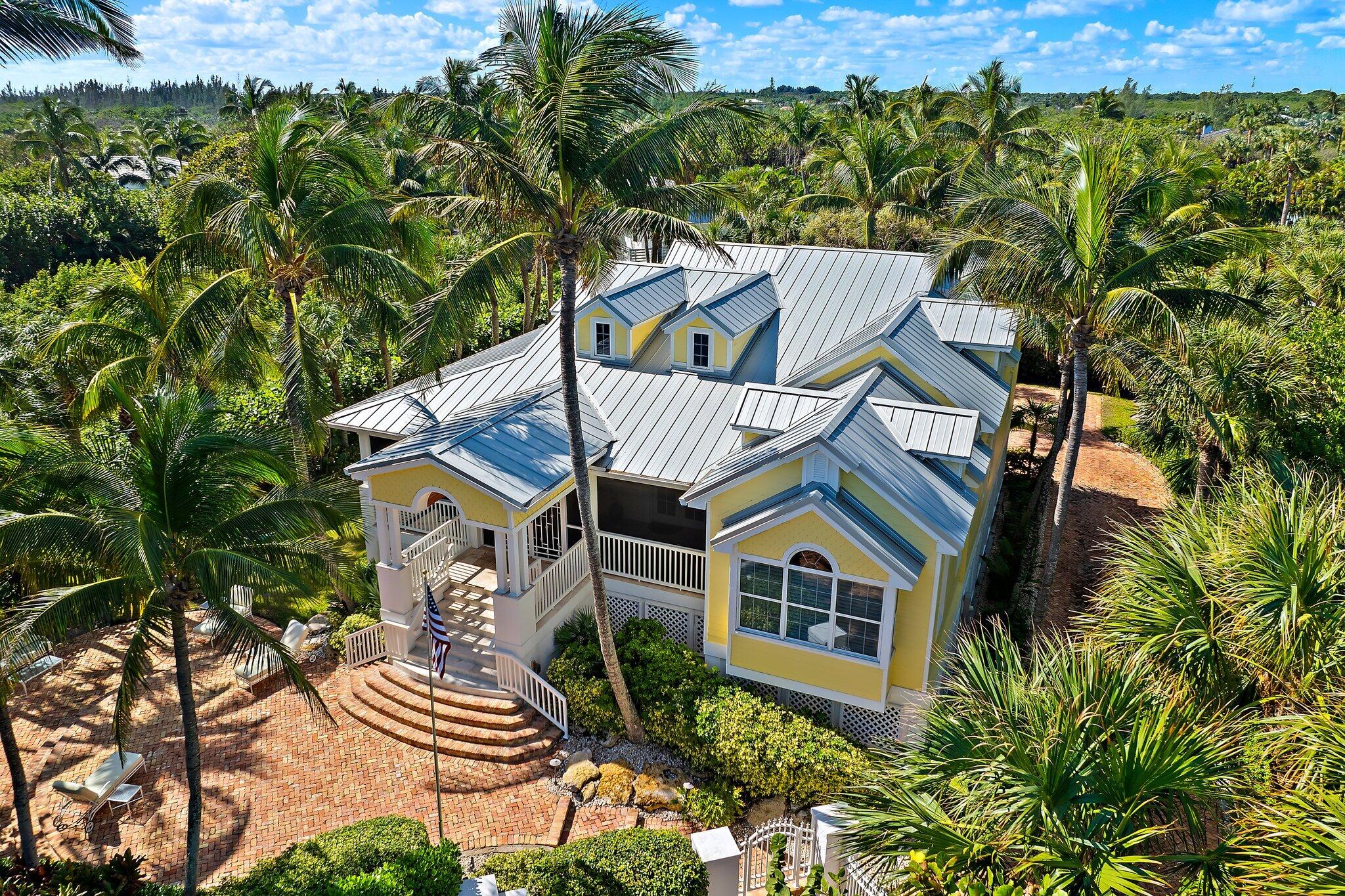 134 North Beach Road Hobe Sound, FL 33455 - Photo 3 of 54 an outdoor view of garden