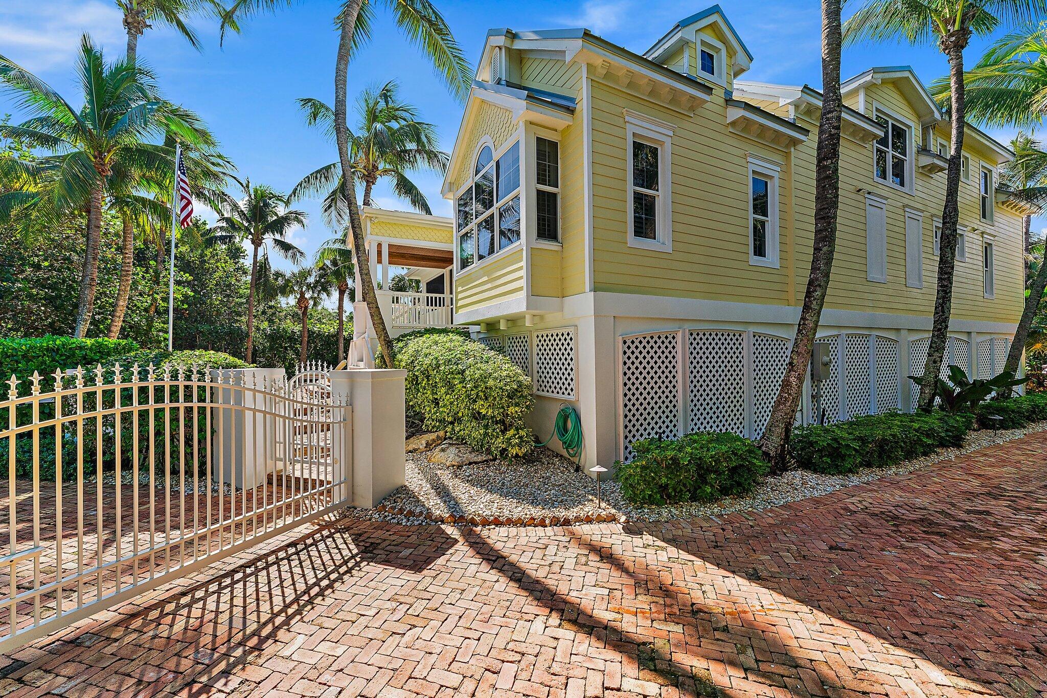 134 North Beach Road Hobe Sound, FL 33455 - Photo 41 of 54 a house view with a garden space