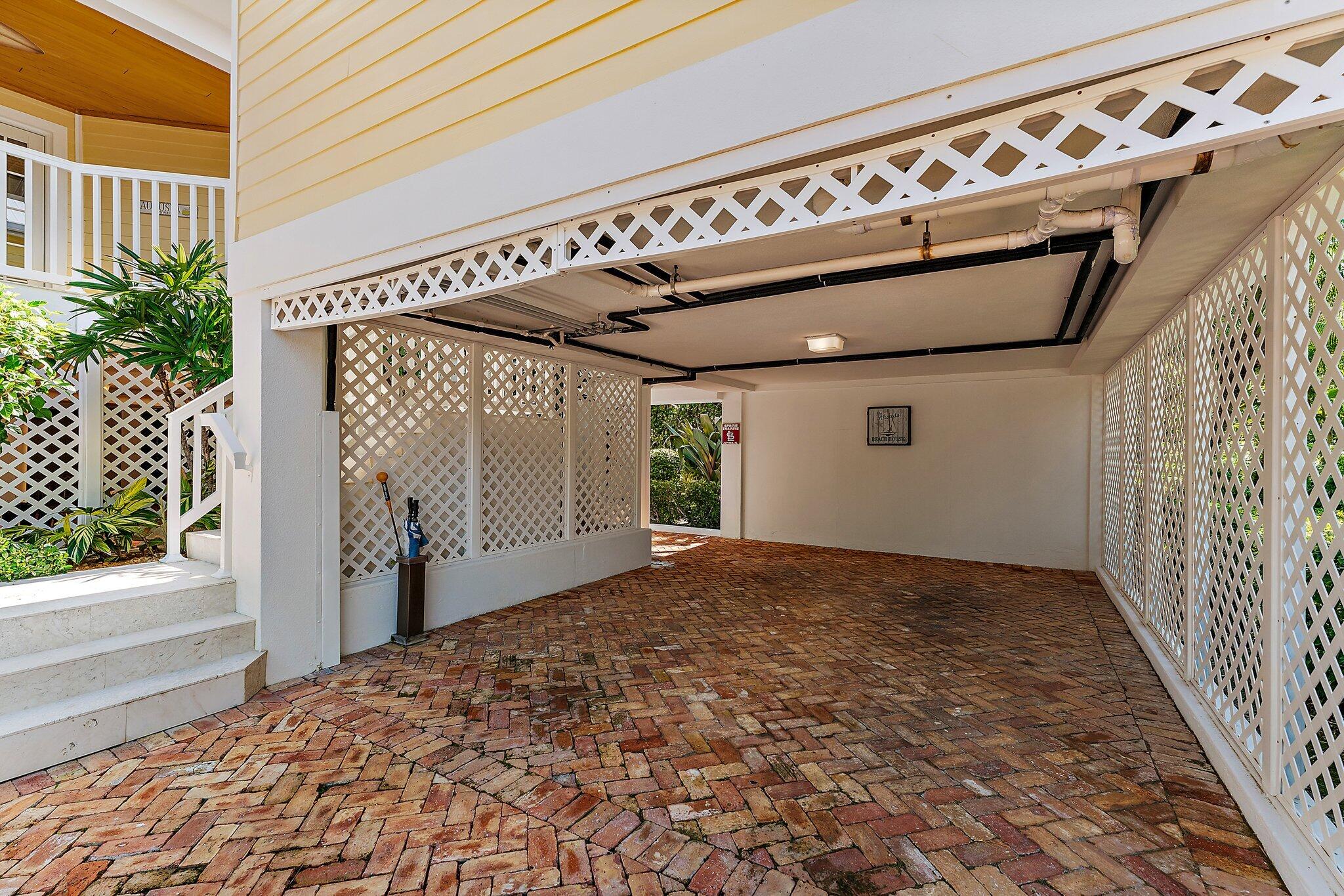 134 North Beach Road Hobe Sound, FL 33455 - Photo 45 of 54 a view of a garage