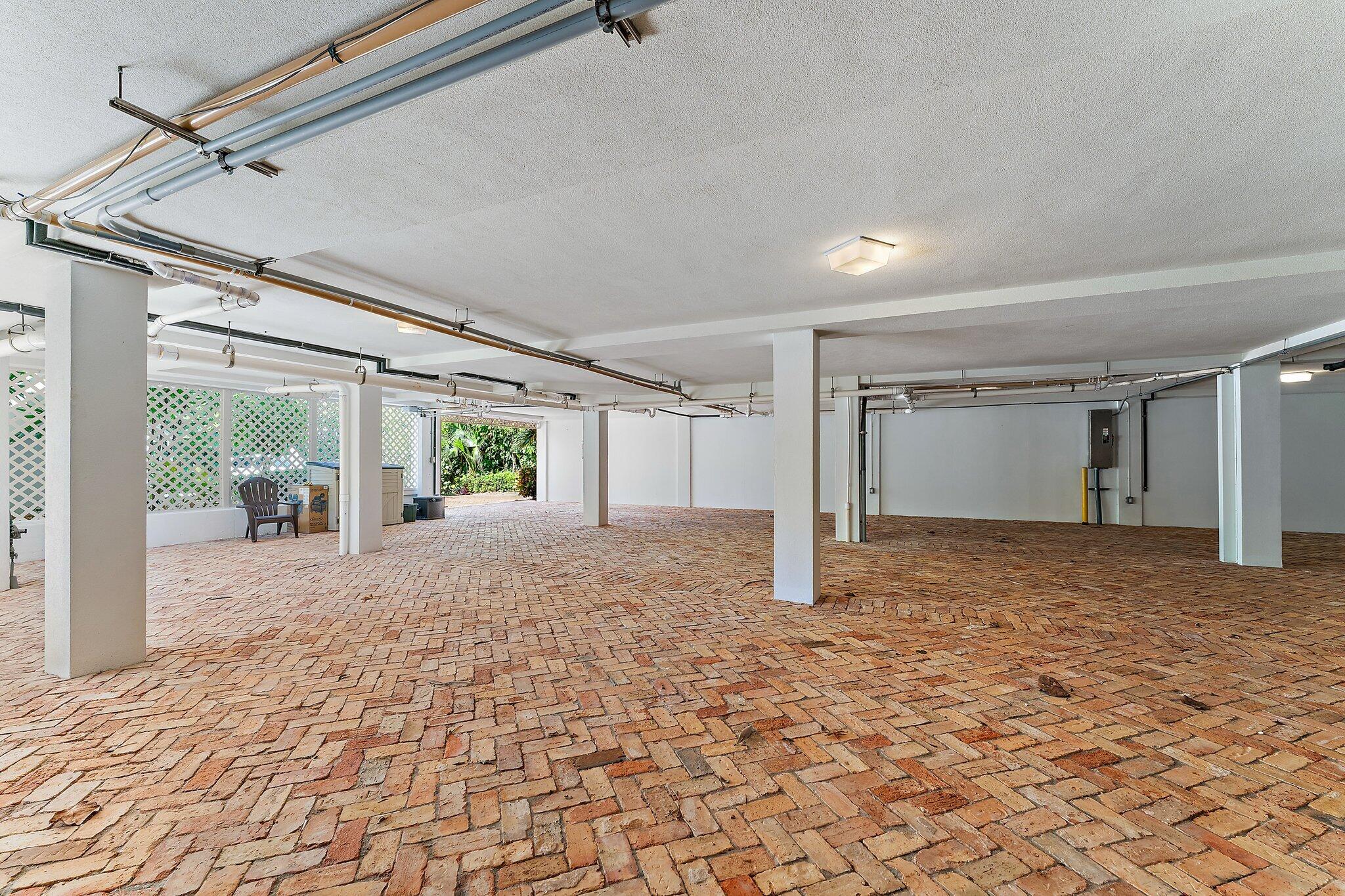 134 North Beach Road Hobe Sound, FL 33455 - Photo 48 of 54 a view of a big room with wooden floor and windows