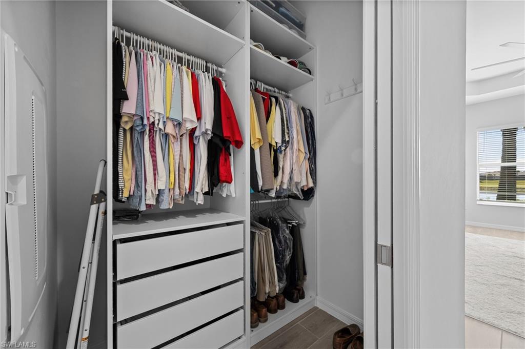 5415 Ternberry Road Ave Maria, FL 34142 - Photo 26 of 45 a view of walk in closet with clothes and shoes