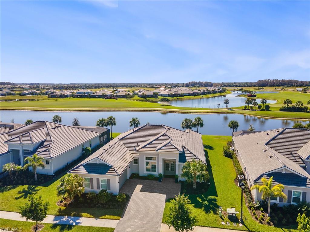 5415 Ternberry Road Ave Maria, FL 34142 - Photo 3 of 45 an aerial view of a house with a swimming pool yard and outdoor seating