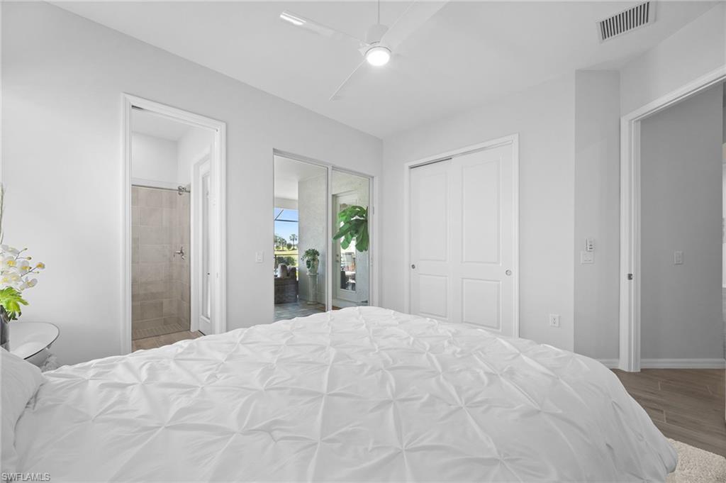 5415 Ternberry Road Ave Maria, FL 34142 - Photo 32 of 45 a large white bed in a bedroom