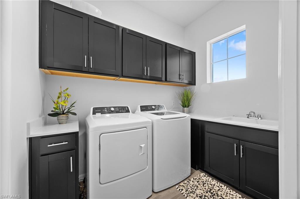 5415 Ternberry Road Ave Maria, FL 34142 - Photo 35 of 45 a utility room with dryer and washer