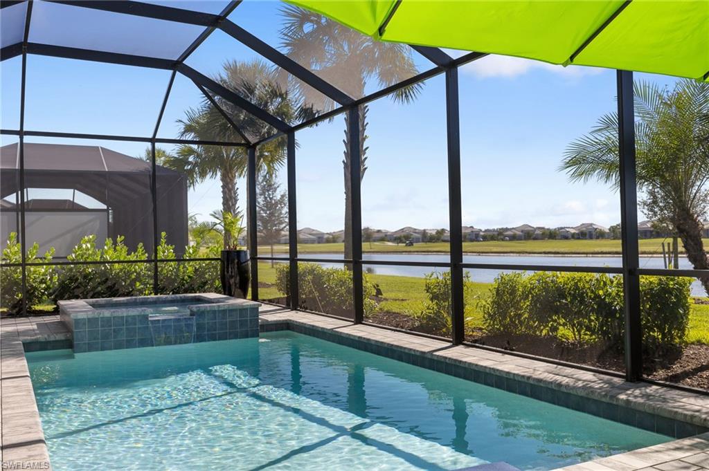 5415 Ternberry Road Ave Maria, FL 34142 - Photo 38 of 45 a view of a street with a patio