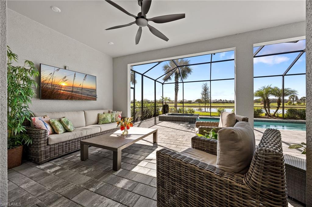 5415 Ternberry Road Ave Maria, FL 34142 - Photo 39 of 45 a living room with fireplace furniture and a large window