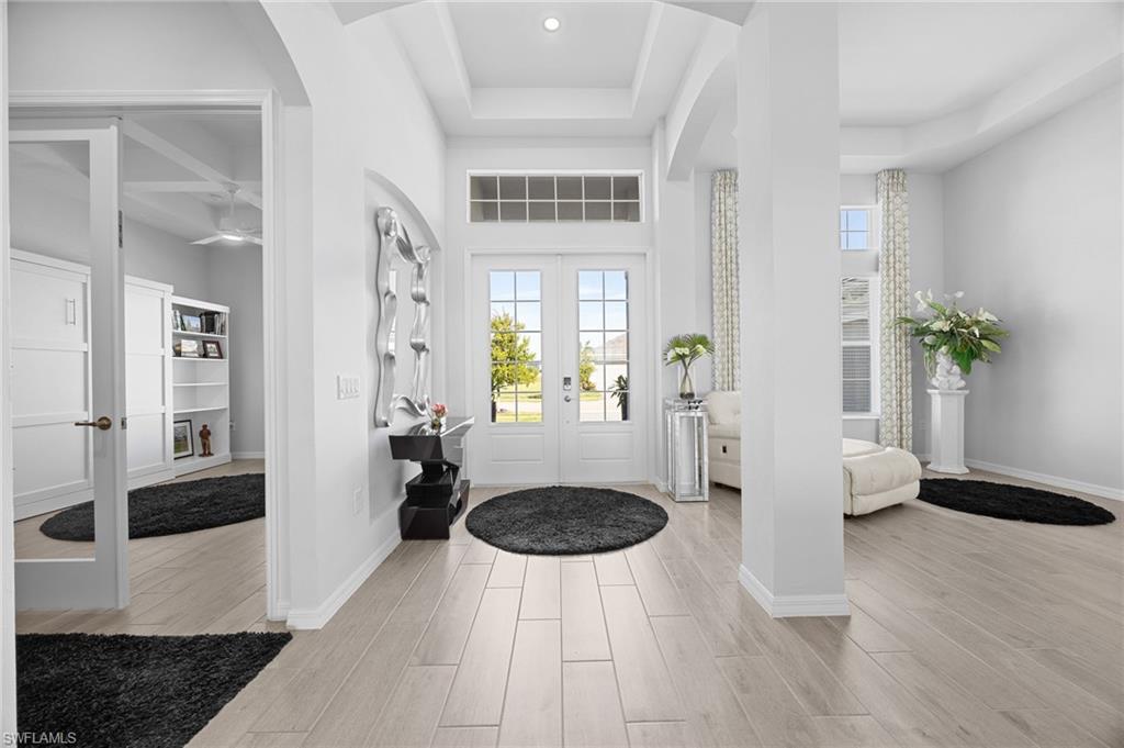 5415 Ternberry Road Ave Maria, FL 34142 - Photo 6 of 45 a view of a livingroom with furniture and wooden floor