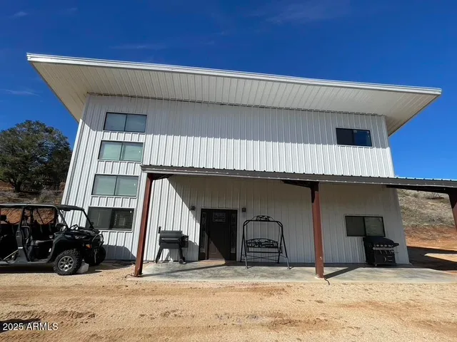 a view of a house with a patio