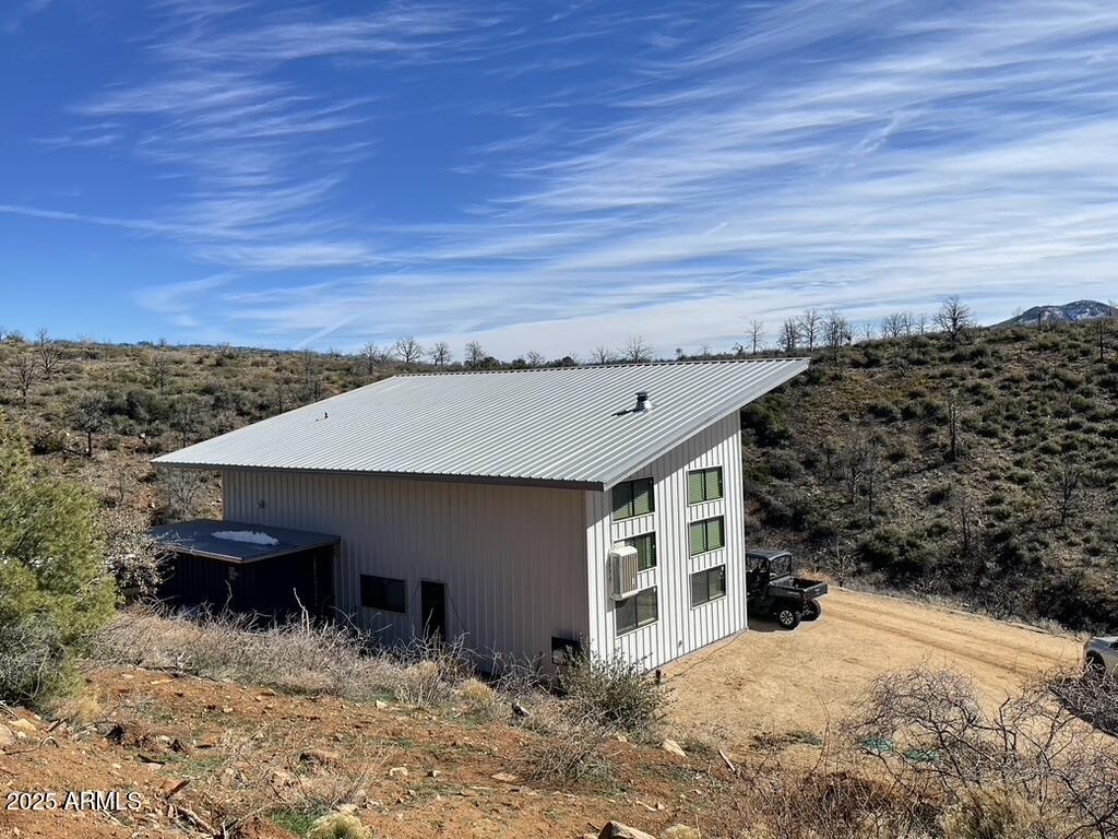 1076 East Horseshoe Springs Road Winkelman, AZ 85192 - Photo 11 of 31 a view of a house with wooden fence