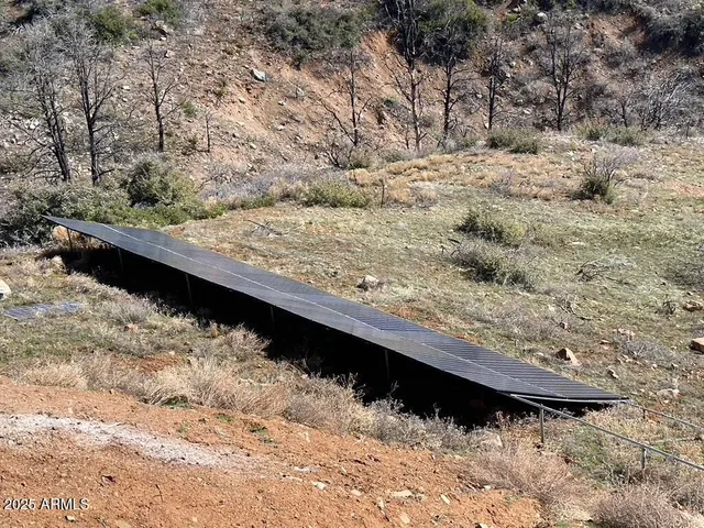 a view of wooden fence and snow