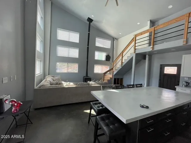 a room with furniture and window