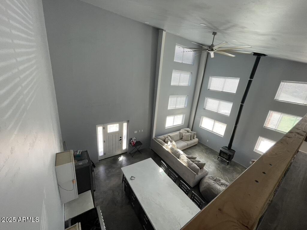 1076 East Horseshoe Springs Road Winkelman, AZ 85192 - Photo 27 of 31 a living room with furniture and a chandelier