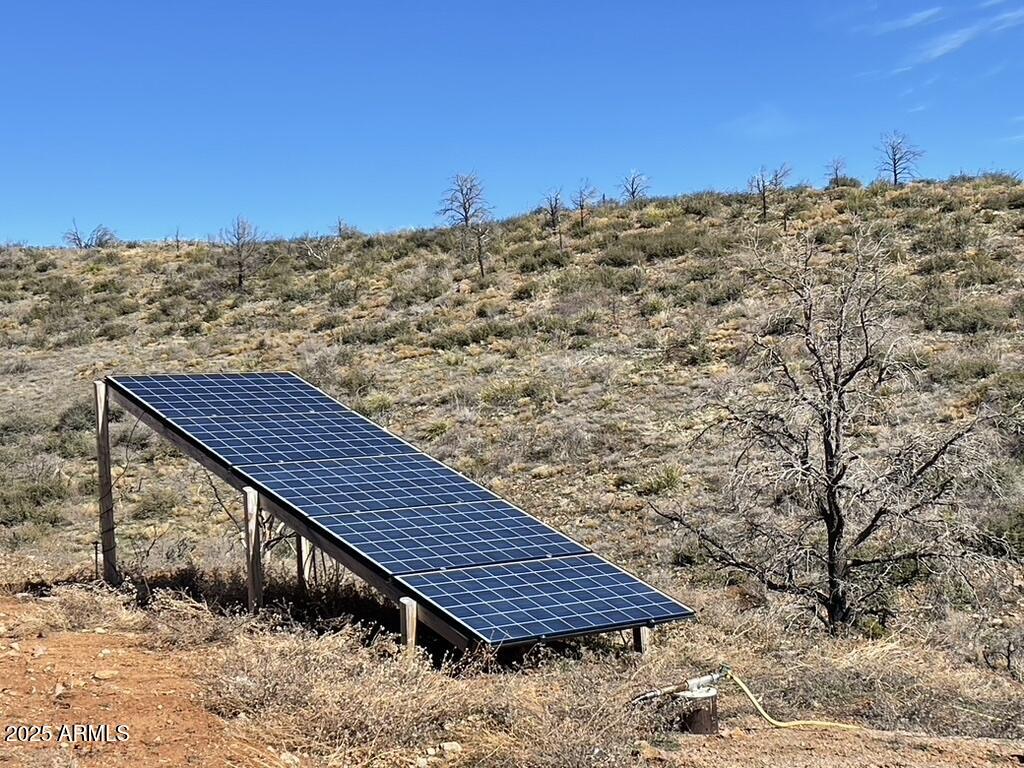 1076 East Horseshoe Springs Road Winkelman, AZ 85192 - Photo 9 of 31 a roof deck view with tall trees