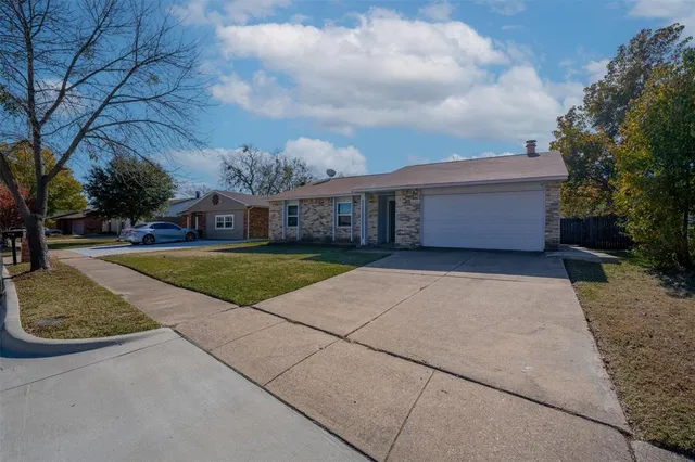 a view of a house with a garden