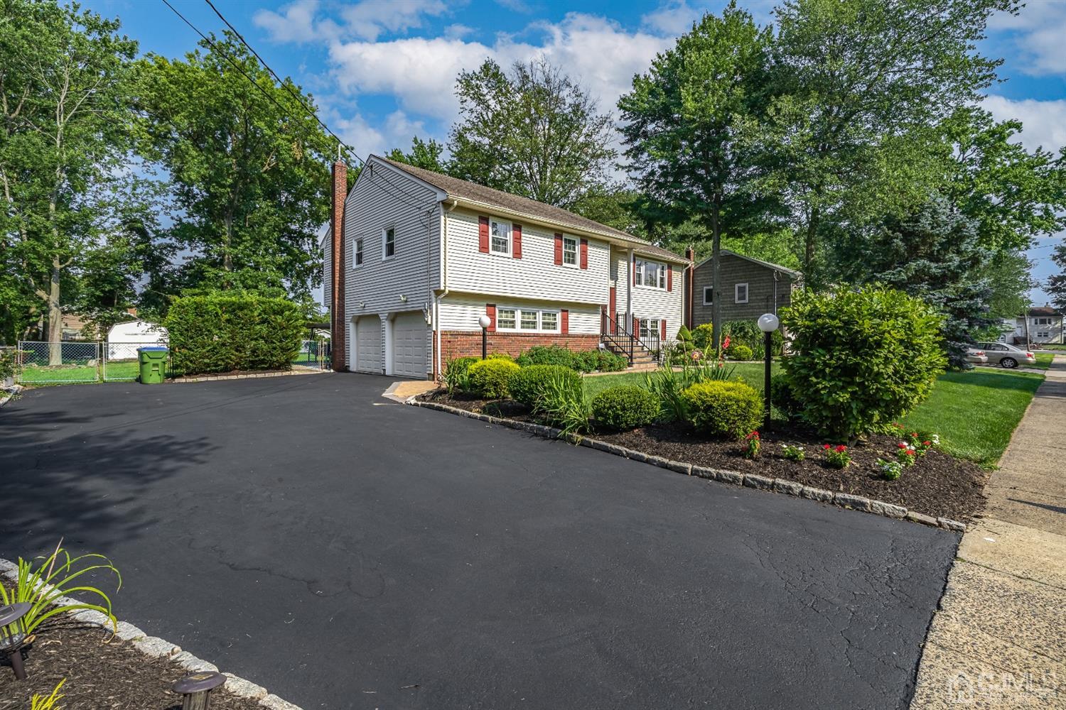 16 Hilltop Road Edison, NJ 08820 - Photo 2 of 30 a view of a house with a street