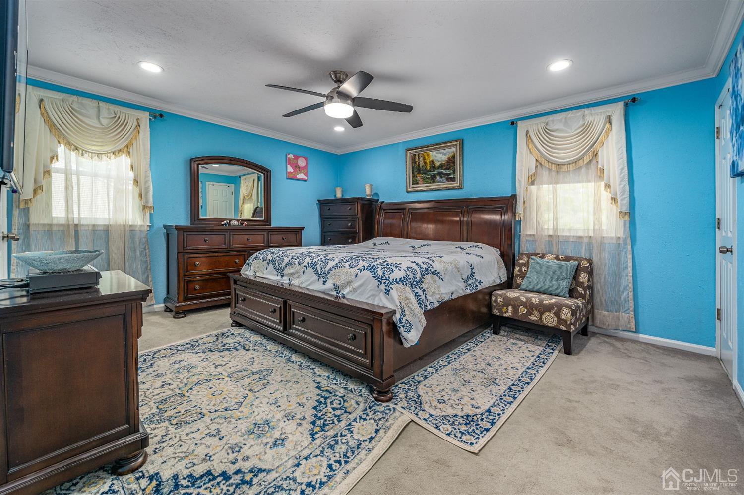 16 Hilltop Road Edison, NJ 08820 - Photo 15 of 30 a bedroom with a bed and furniture