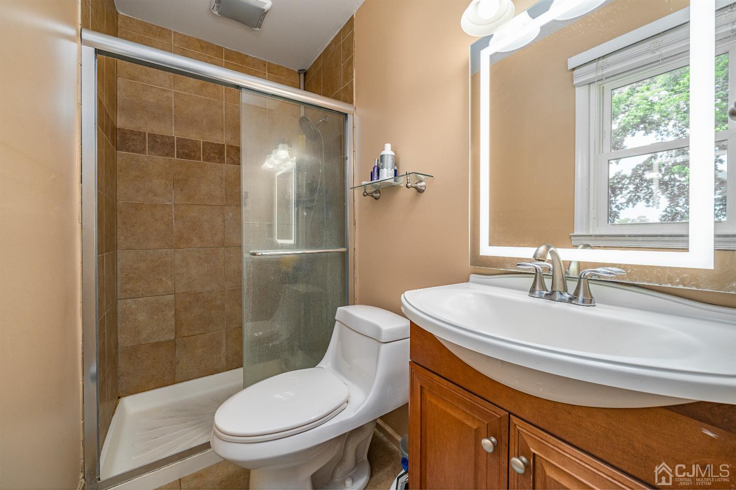 16 Hilltop Road Edison, NJ 08820 - Photo 17 of 30 a bathroom with a sink toilet and shower