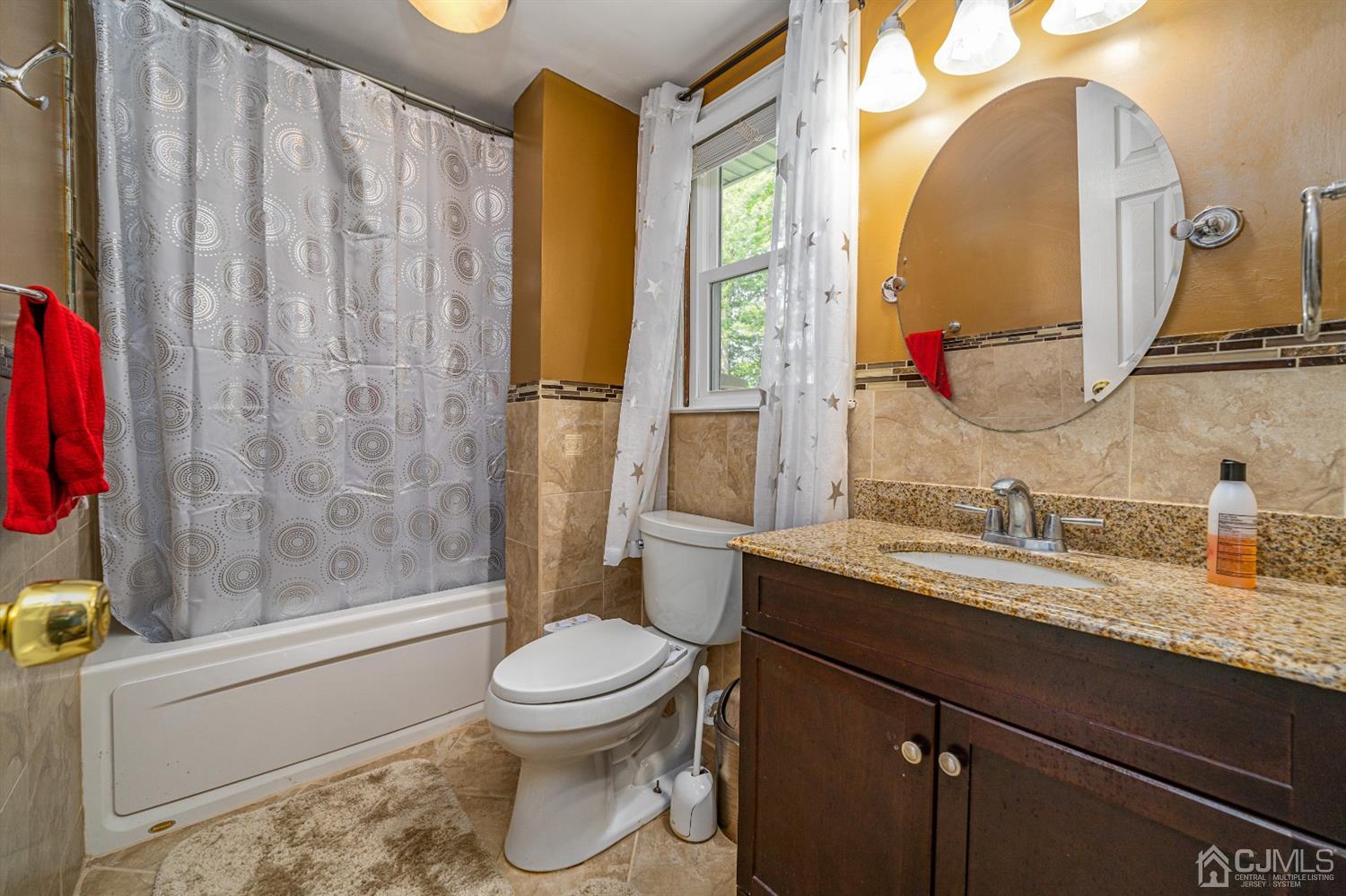 16 Hilltop Road Edison, NJ 08820 - Photo 22 of 30 a bathroom with a granite countertop sink mirror vanity and toilet