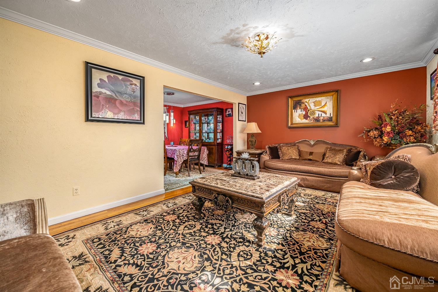 16 Hilltop Road Edison, NJ 08820 - Photo 6 of 30 a living room with furniture and a rug