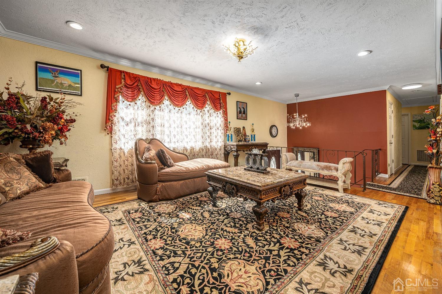 16 Hilltop Road Edison, NJ 08820 - Photo 7 of 30 a living room with furniture and a large window