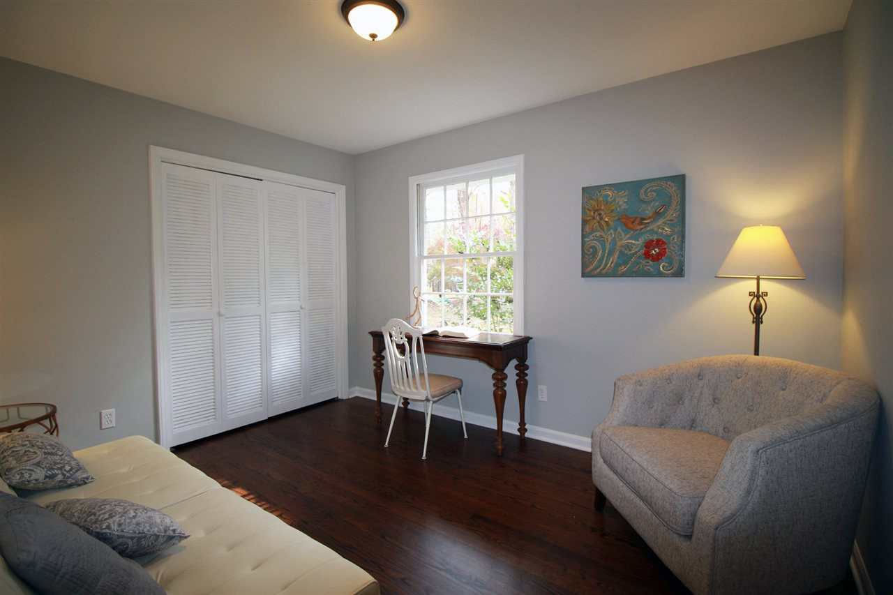 308 Lord Berkley Road Raleigh, NC 27610 - Photo 21 of 25 This bedroom is a nice size and is set up as a guest bedroom/office. There is a nice double sized closet complete with wire shelving inside. The window looks out onto the beautiful front yard. Third Bedroom