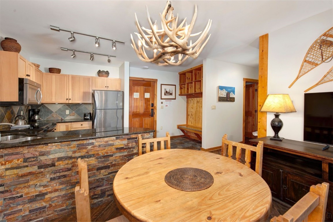 100 Dercum Square, Unit 8362 Keystone, CO 80435 - Photo 8 of 35 a very nice looking dining room with a large window