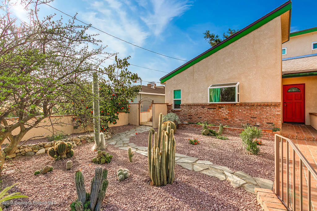 4329 El Prieto Road Altadena, CA 91001 - Photo 21 of 28 a front view of a house with garden