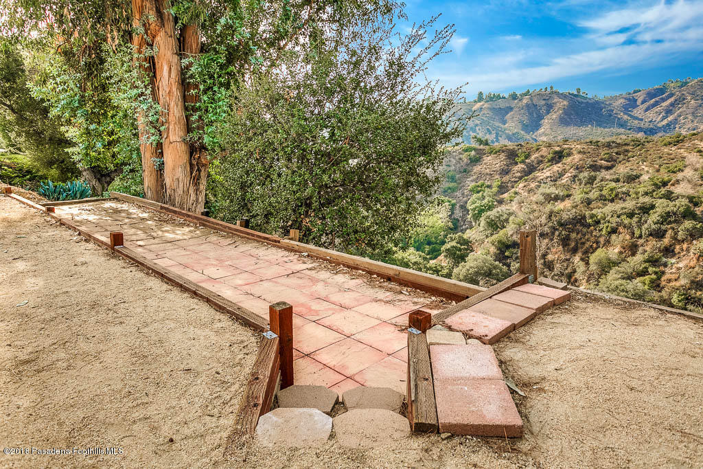 4329 El Prieto Road Altadena, CA 91001 - Photo 27 of 28 a view of a backyard with wooden fence