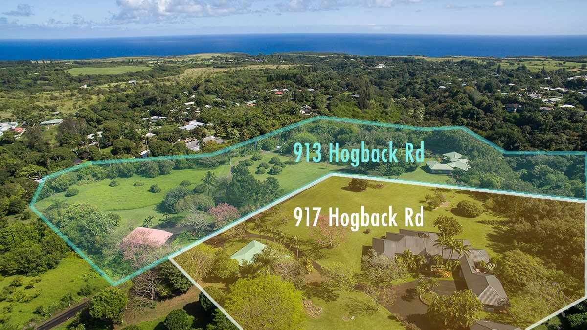 913 Hog Back Road Haiku, HI 96708 - Photo 18 of 18 a view of a swimming pool with a city view