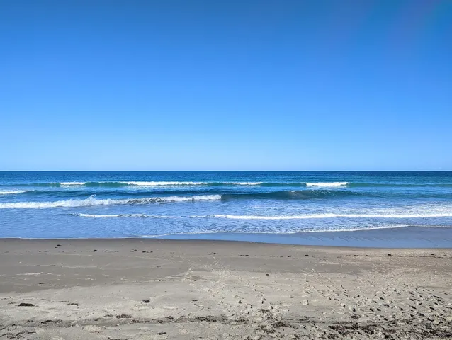 a view of beach and ocean