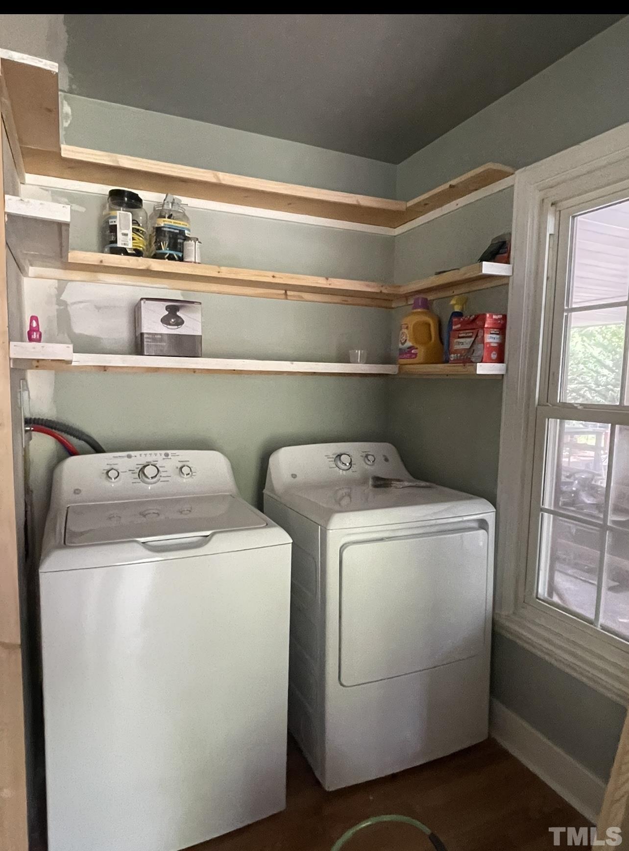 308 Parham Road Henderson, NC 27536 - Photo 13 of 27 a utility room with dryer and washer