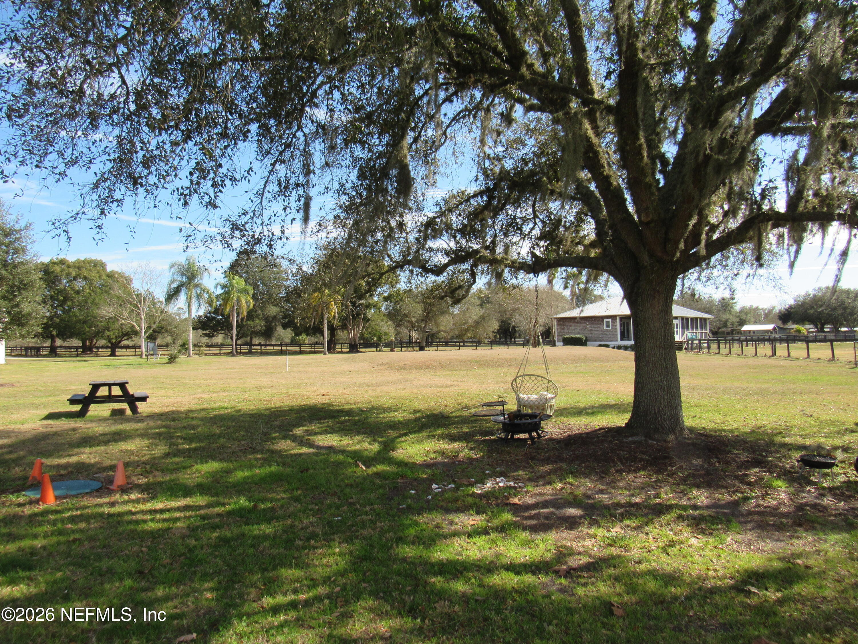 5100 Silo Road St. Augustine, FL 32092 - Photo 5 of 9 a view of swimming pool with a yard