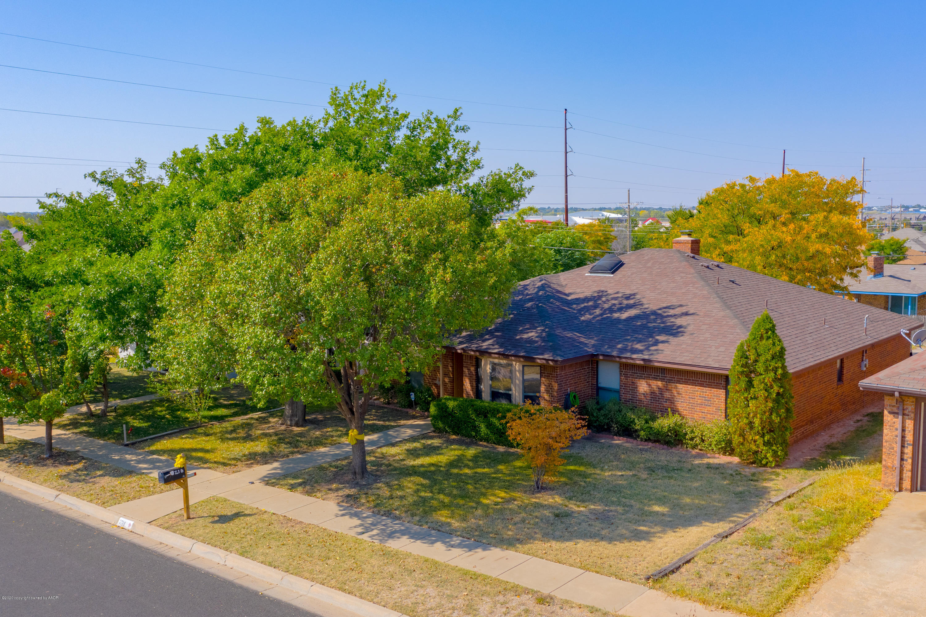 5718 South Fannin Street Amarillo, TX 79110 - Photo 1 of 31 a view of a house with basketball court