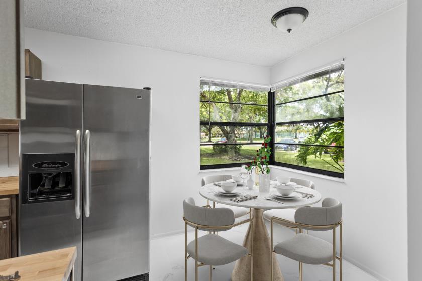 9740 West McNab Road, Unit 111 Tamarac, FL 33321 - Photo 7 of 24 IMG_3050