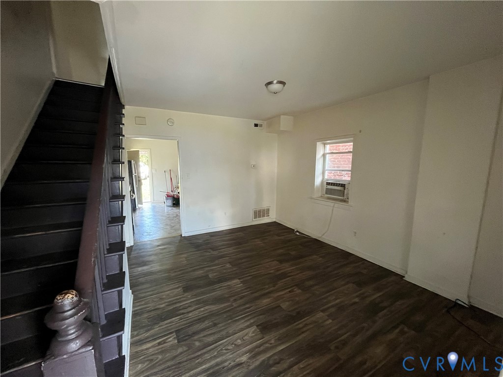 703-705 Harding Street Petersburg, VA 23803 - Photo 12 of 14 a view of wooden floor and windows in a room