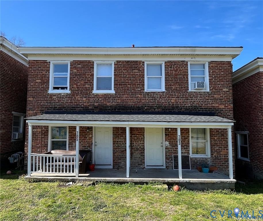 703-705 Harding Street Petersburg, VA 23803 - Photo 14 of 14 a front view of a house with a yard