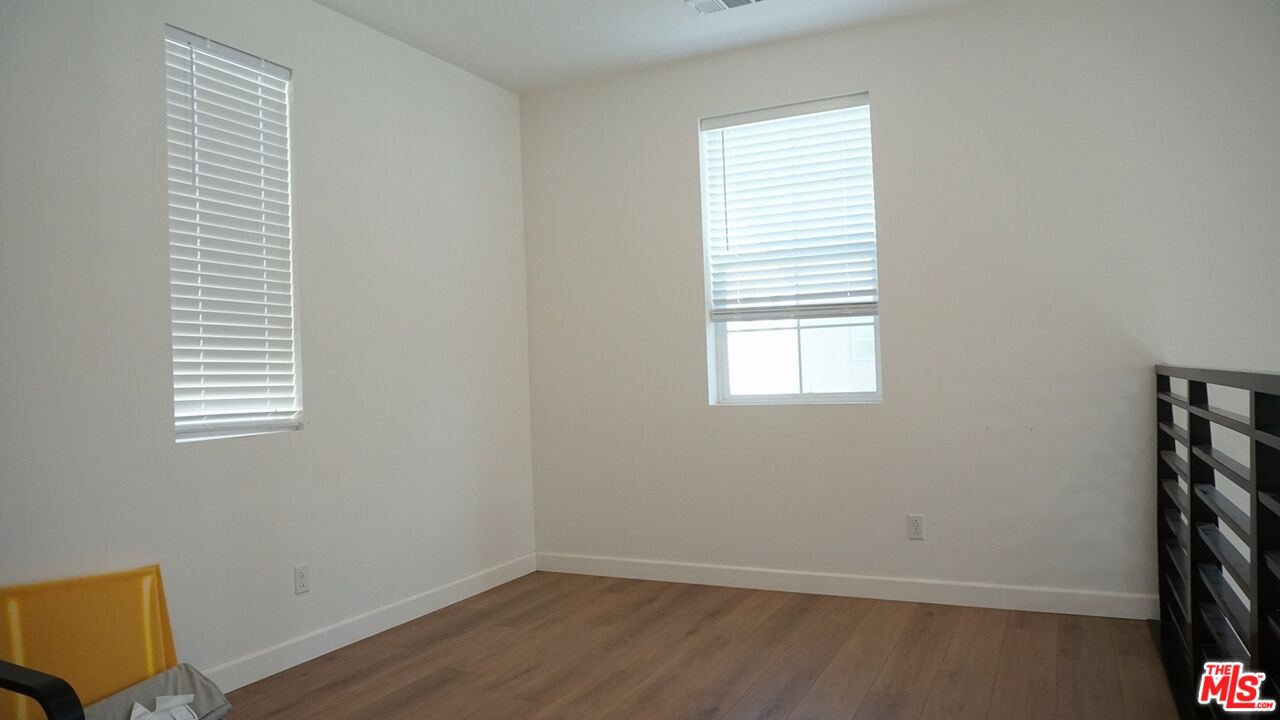 8564 Exposition Street Chino, CA 91708 - Photo 20 of 29 a view of a room that has a window in it