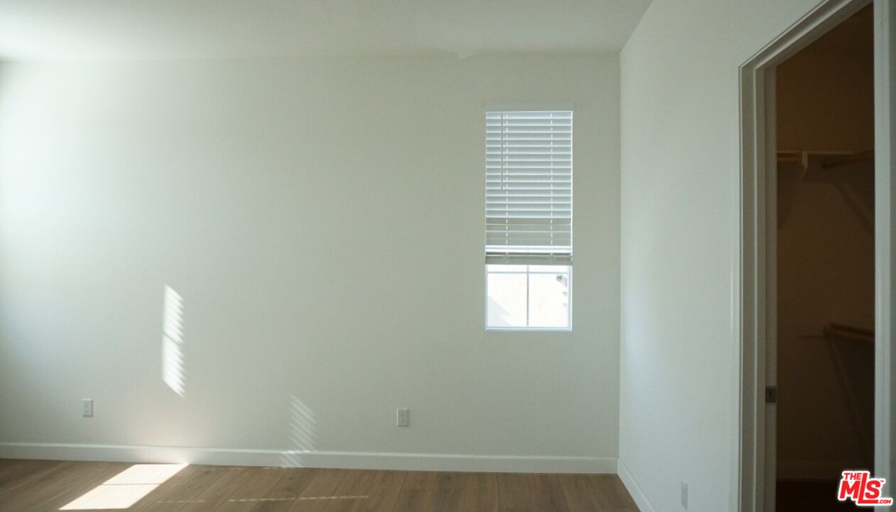 8564 Exposition Street Chino, CA 91708 - Photo 21 of 29 a view of a room that has a window in it
