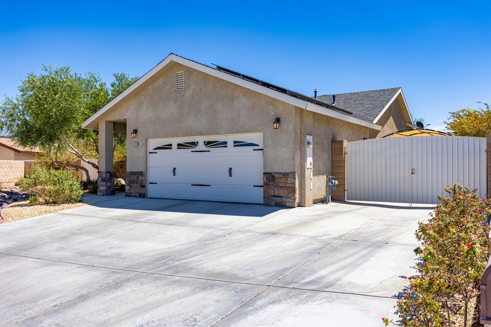 420 Scott Street Ridgecrest, CA 93555 - Photo 9 of 50 a front view of a house with a yard
