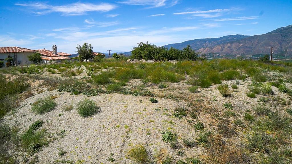 4 Rim Of The Valley Valley Center, CA 92082 - Photo 6 of 12 a view of a lake with mountains in the background