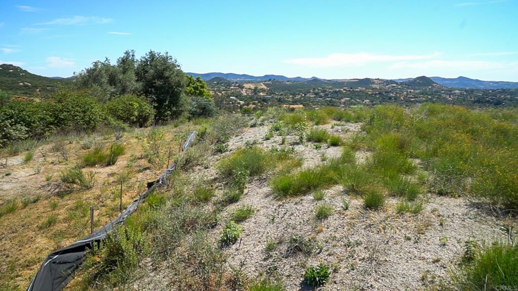 4 Rim Of The Valley Valley Center, CA 92082 - Photo 10 of 12 a view of a lake with mountains in the background