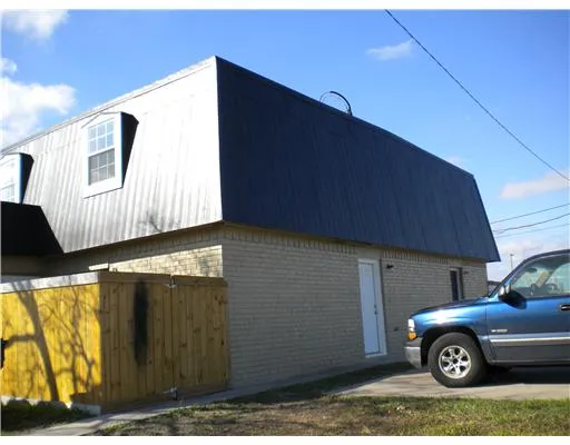 a car parked in front of a house
