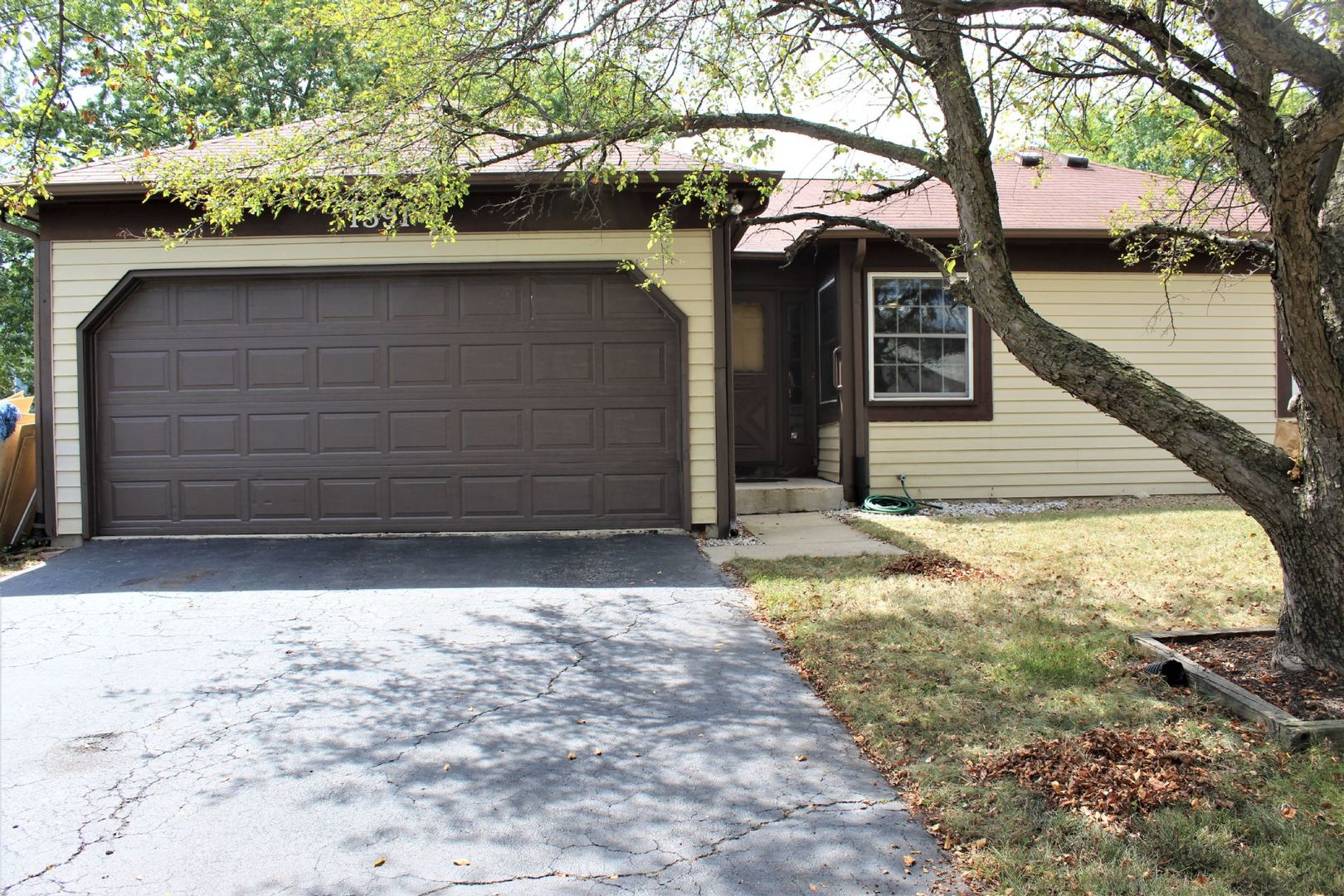 1391 Rennet Drive Naperville, IL 60565 - Photo 1 of 21 a front view of house with yard