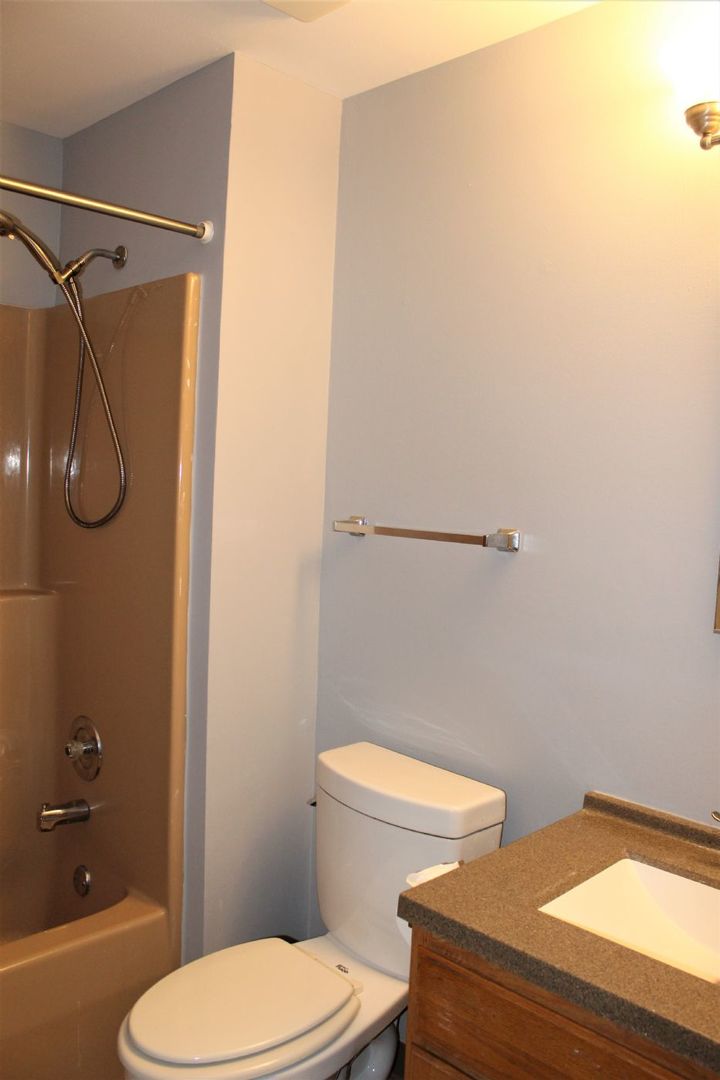 1391 Rennet Drive Naperville, IL 60565 - Photo 15 of 21 a bathroom with a toilet and a shower